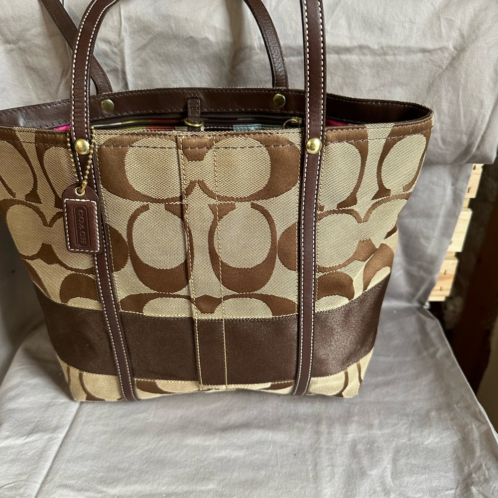 Light and dark brown medium coach purse
